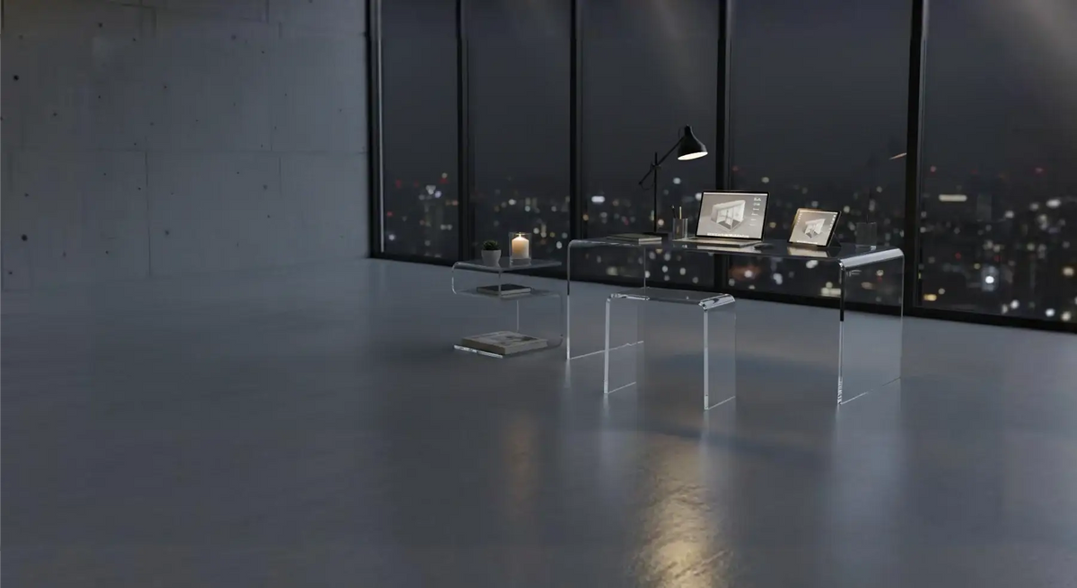 Modern clear acrylic furniture featuring a desk and side table in a contemporary office setting.