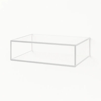Minimalist floating nightstand made of clear acrylic, perfect for adding modern style to any bedroom.
