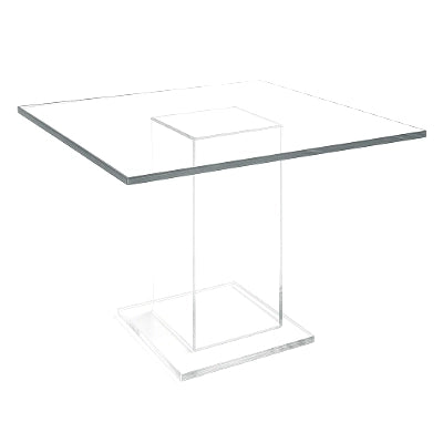 pedestal-style dining table in clear acrylic